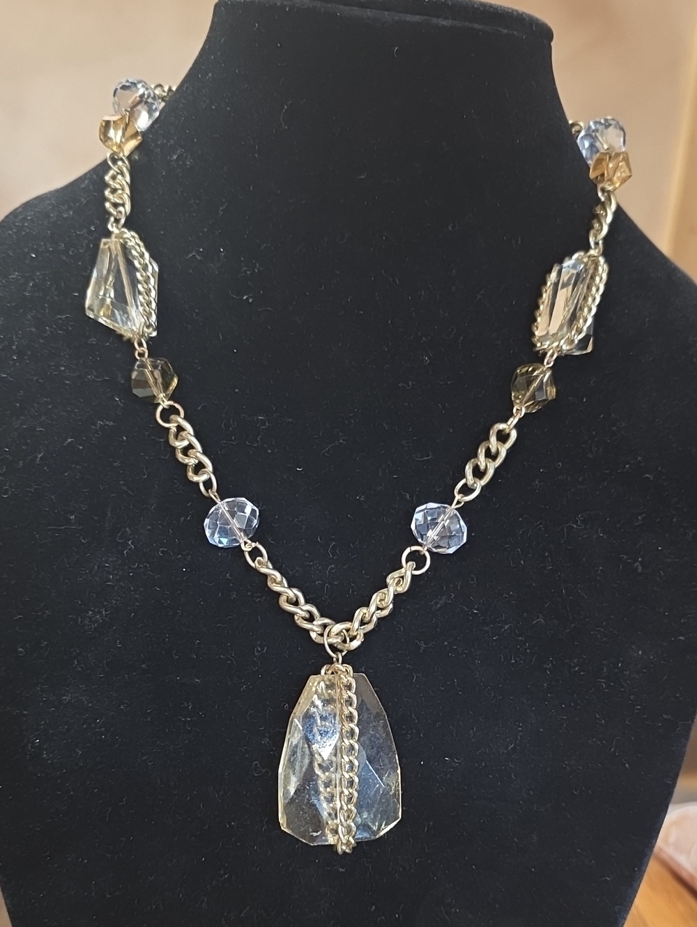Elegant Gold-Tone Crystal Pendant Necklace in Clear and Light Amber